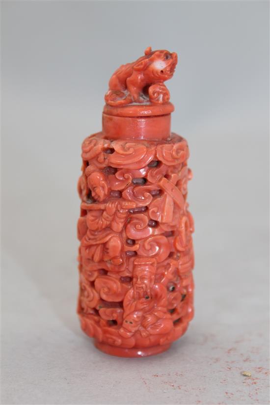 A Chinese coral snuff bottle, late 19th / early 20th century, 7.5cm, stopper glued